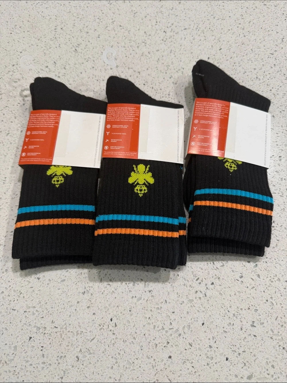 Bombas Black Crew Athletic Socks with Blue and Orange Stripes B2